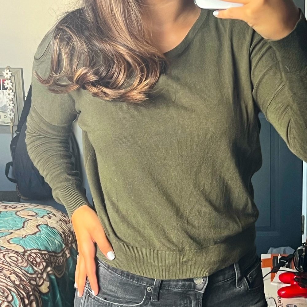 Olive green long-sleeve; Size small crop top with soft fabric and back design